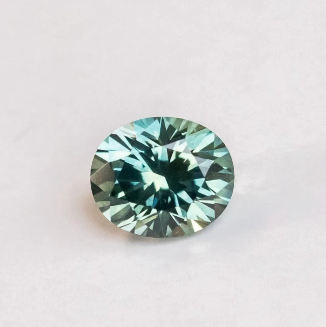 1.52ct Precision Cut Teal Green Oval Montana Sapphire Evergreen Carved Solitaire in 14k Yellow Gold