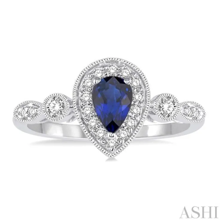 6X4 MM Pear shape Sapphire Center and 1/4 Ctw Round Cut Diamond Ring in 14K White Gold