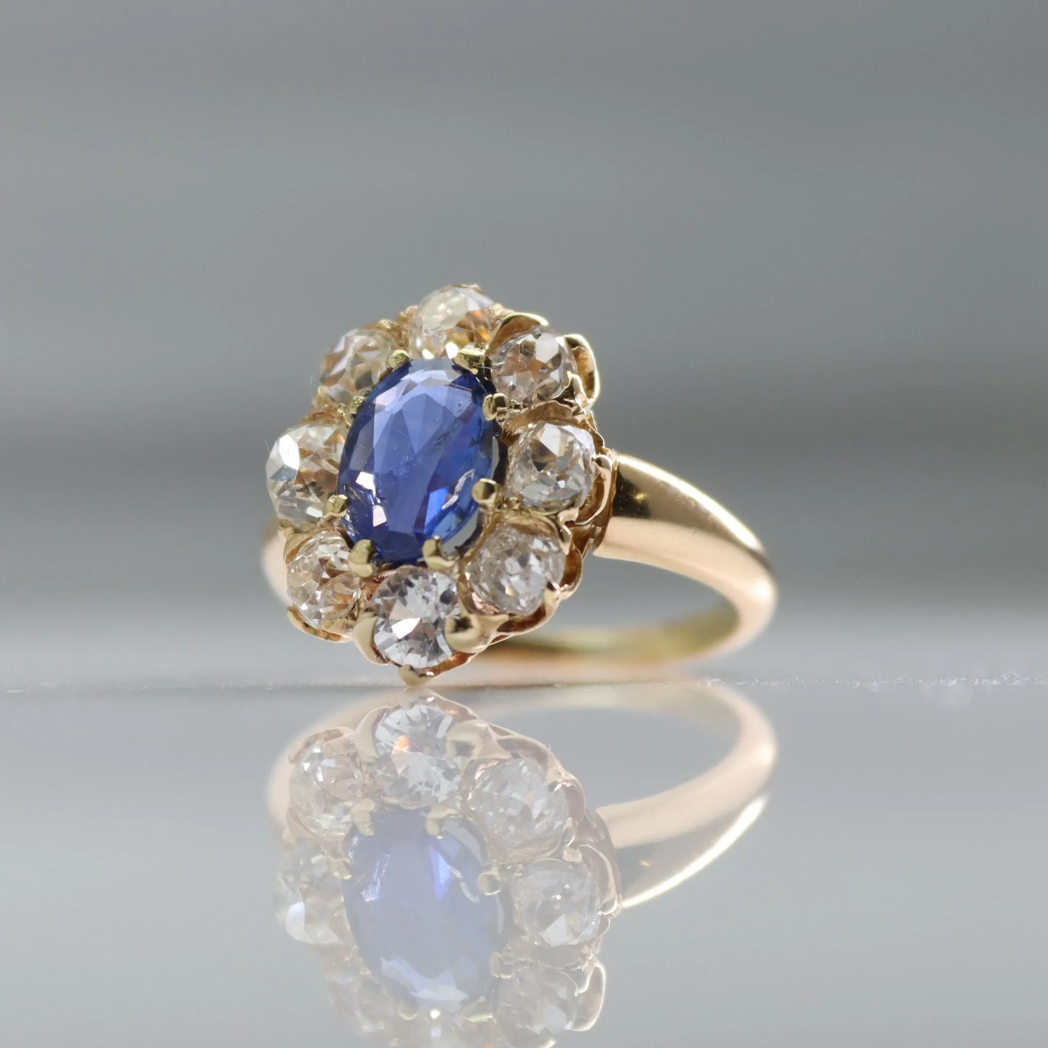 Art Deco 18 carat Gold Sapphire and Diamond Cluster Ring