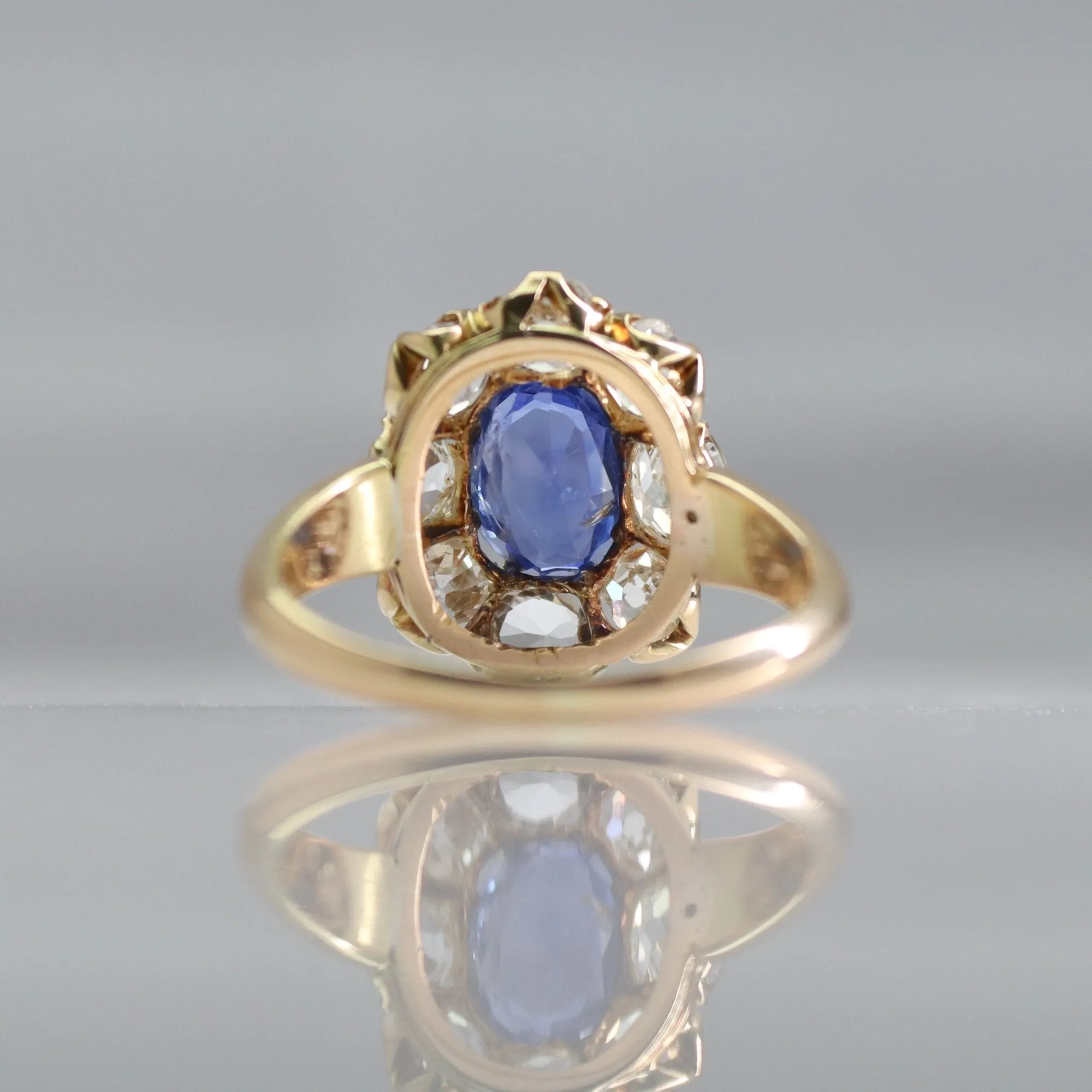 Art Deco 18 carat Gold Sapphire and Diamond Cluster Ring