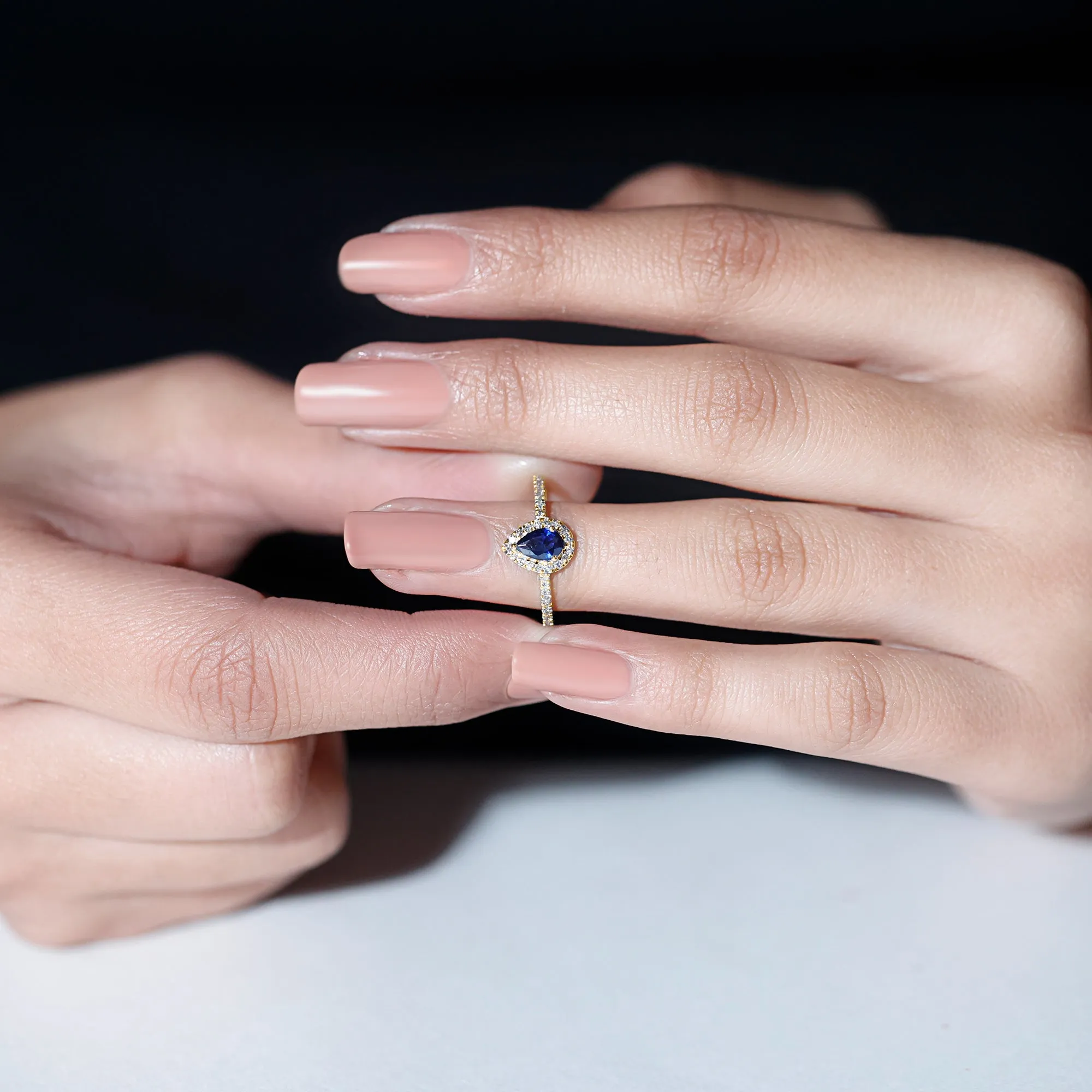 Pear Cut Created Blue Sapphire and Diamond Halo Ring