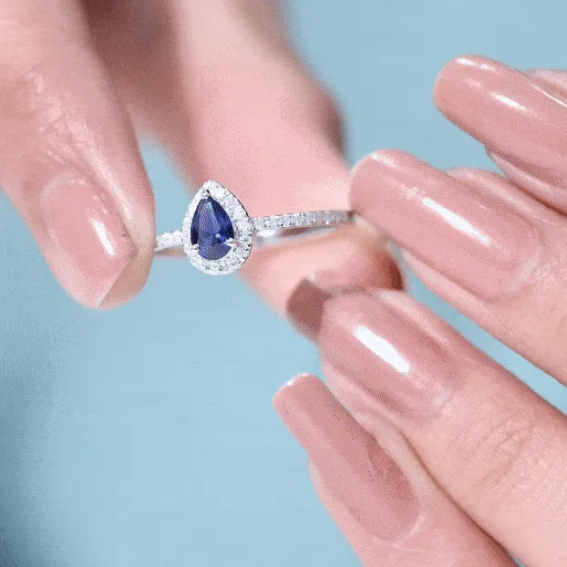 Pear Cut Created Blue Sapphire and Diamond Halo Ring