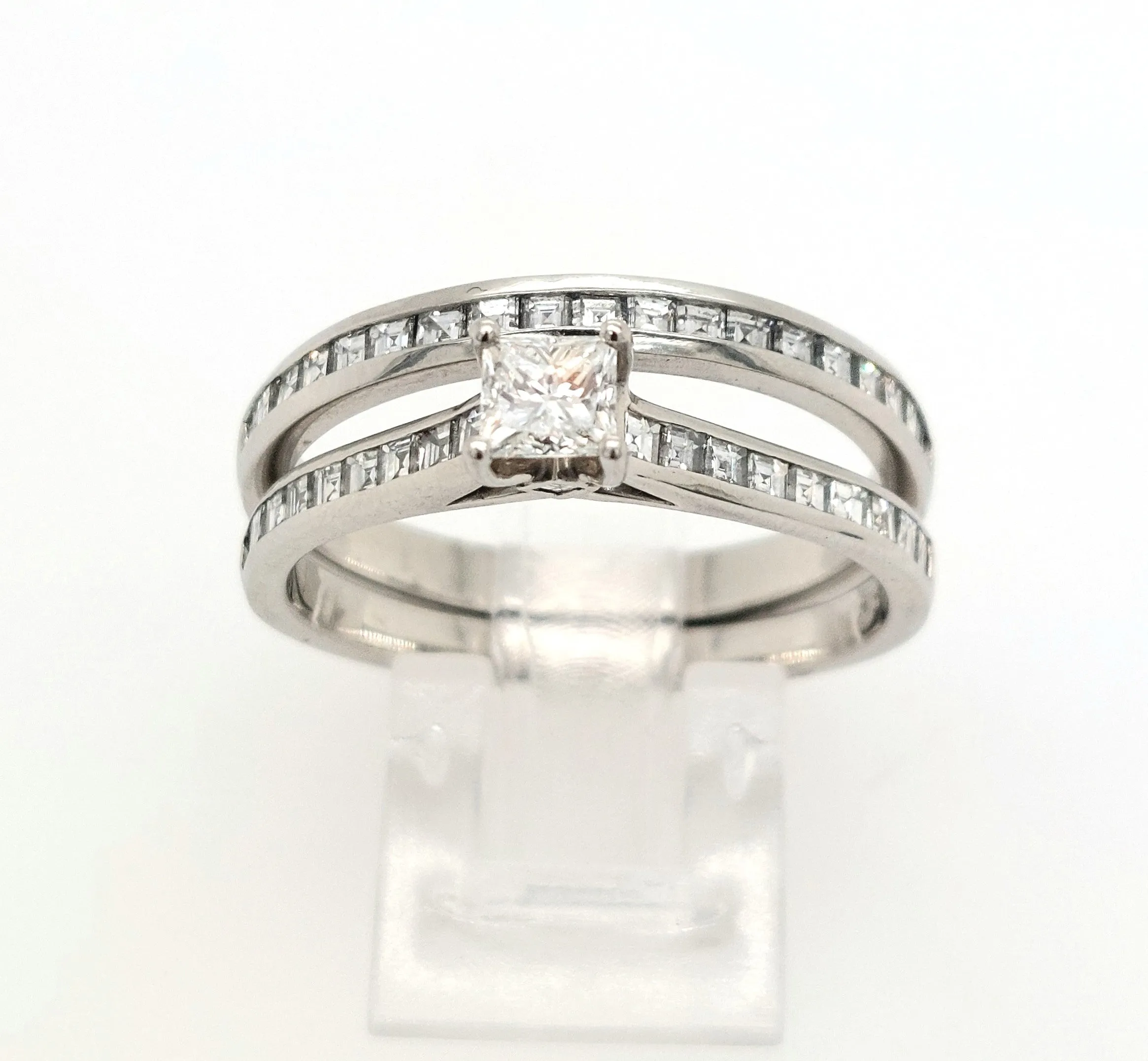 Platinum Wed Set: Engagement Ring: 1.45ctTW of H-I/SI1 diamonds, .25ct center, 1.20 side diamonds. Size: 11½