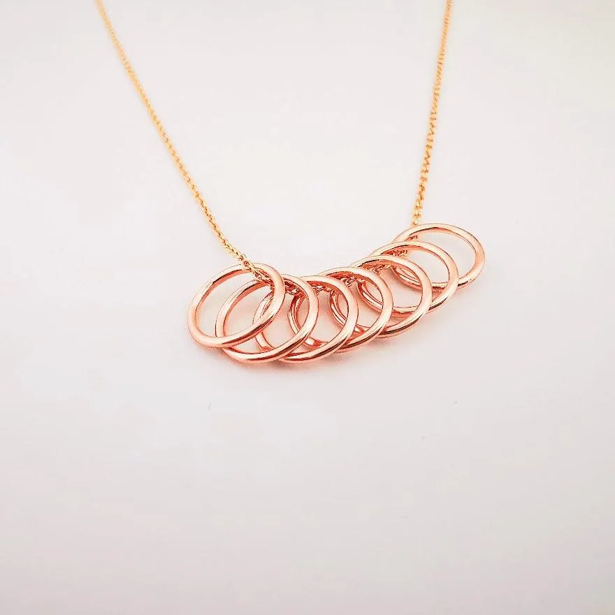 Rose Gold Seven Ring Story Necklace